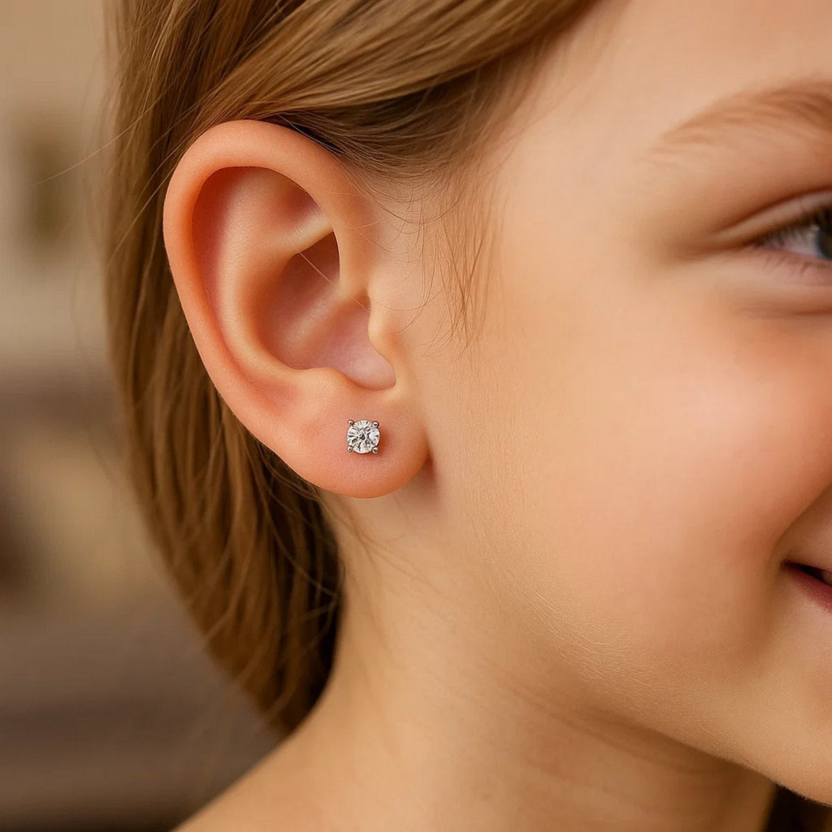Woman wearing 925 sterling silver 3mm cubic zirconia stud earring close up lifestyle