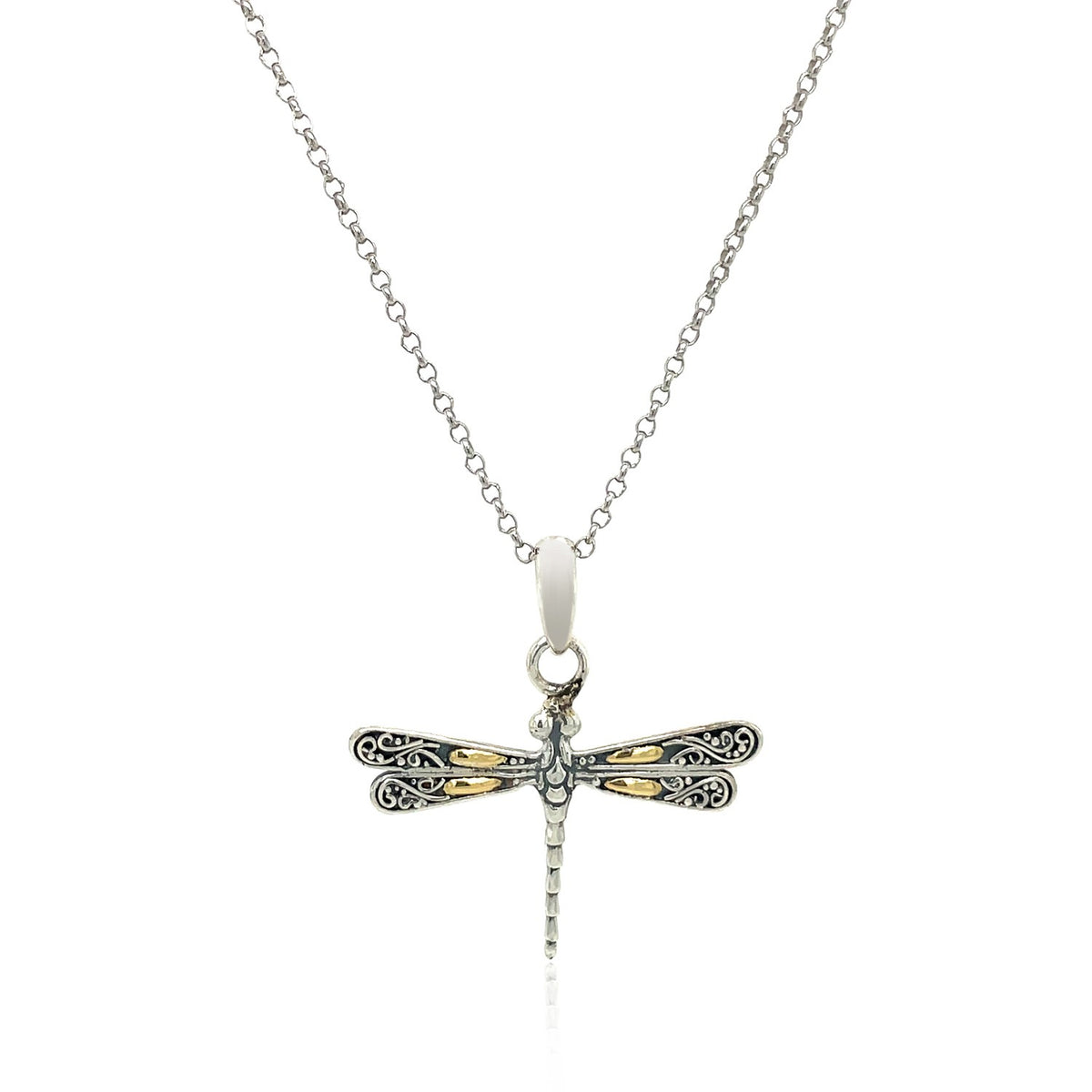 Close-up of 18K gold scrollwork dragonfly wings on 925 sterling silver pendant, nature-inspired jewelry