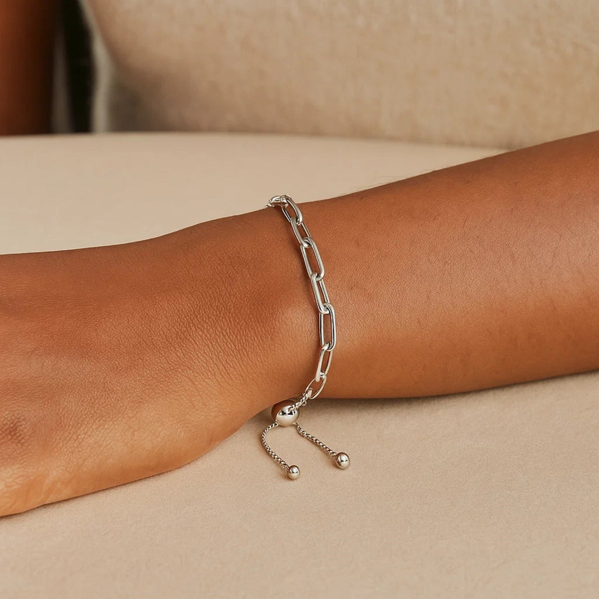 Adjustable Sterling Silver paperclip link bracelet for women, showing its versatile draw string clasp.