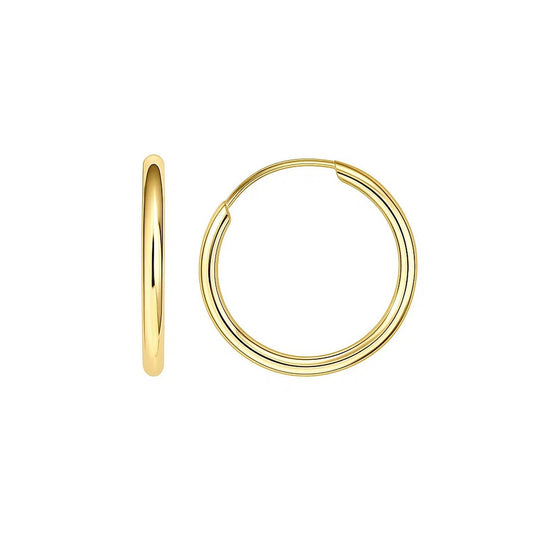 Solid 10k yellow gold endless hoop earrings 1.5x14mm on plain studio background